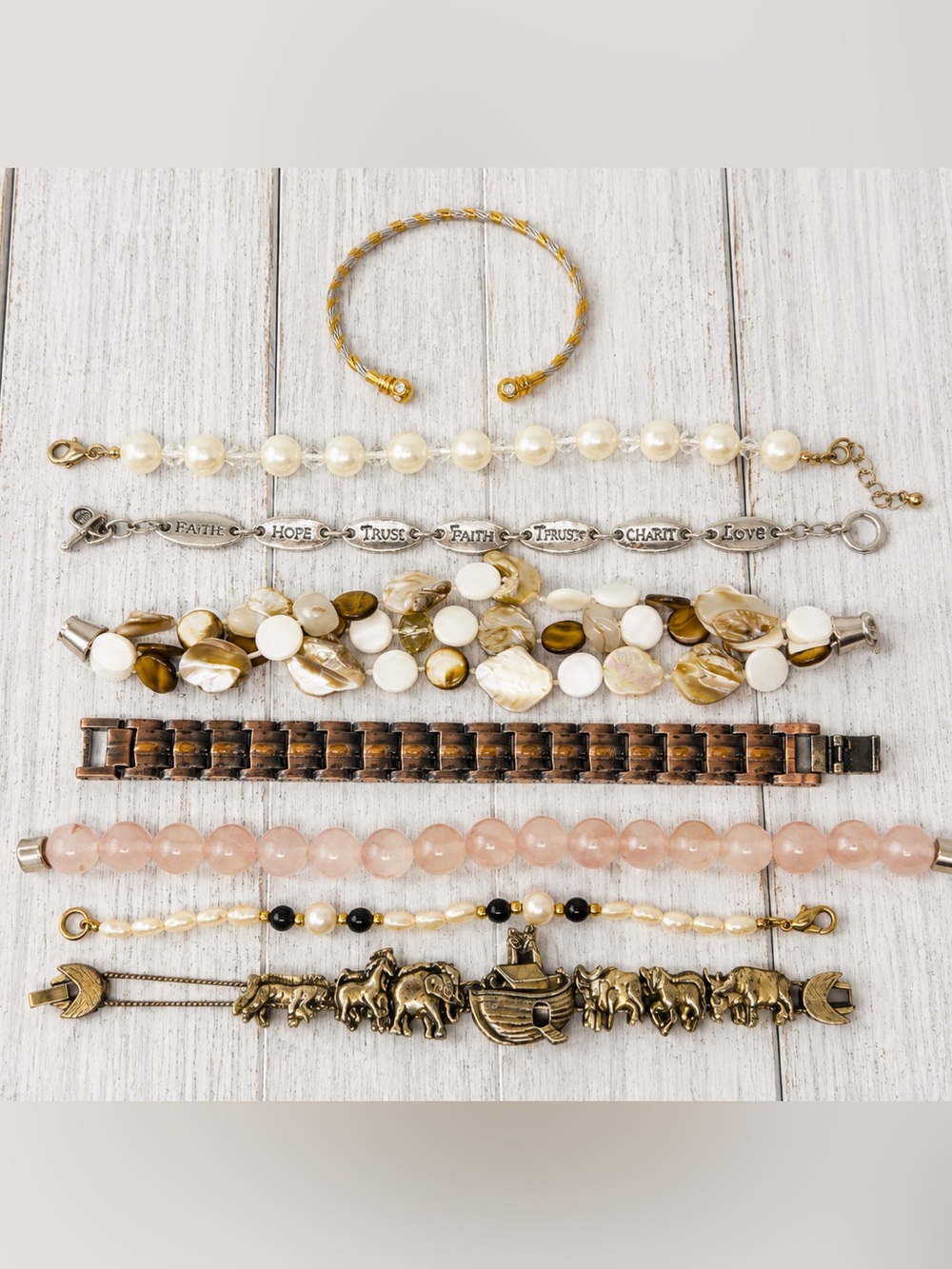 505. Lot of 8 Assorted Gold, Copper, and Pearl Women's Bracelets